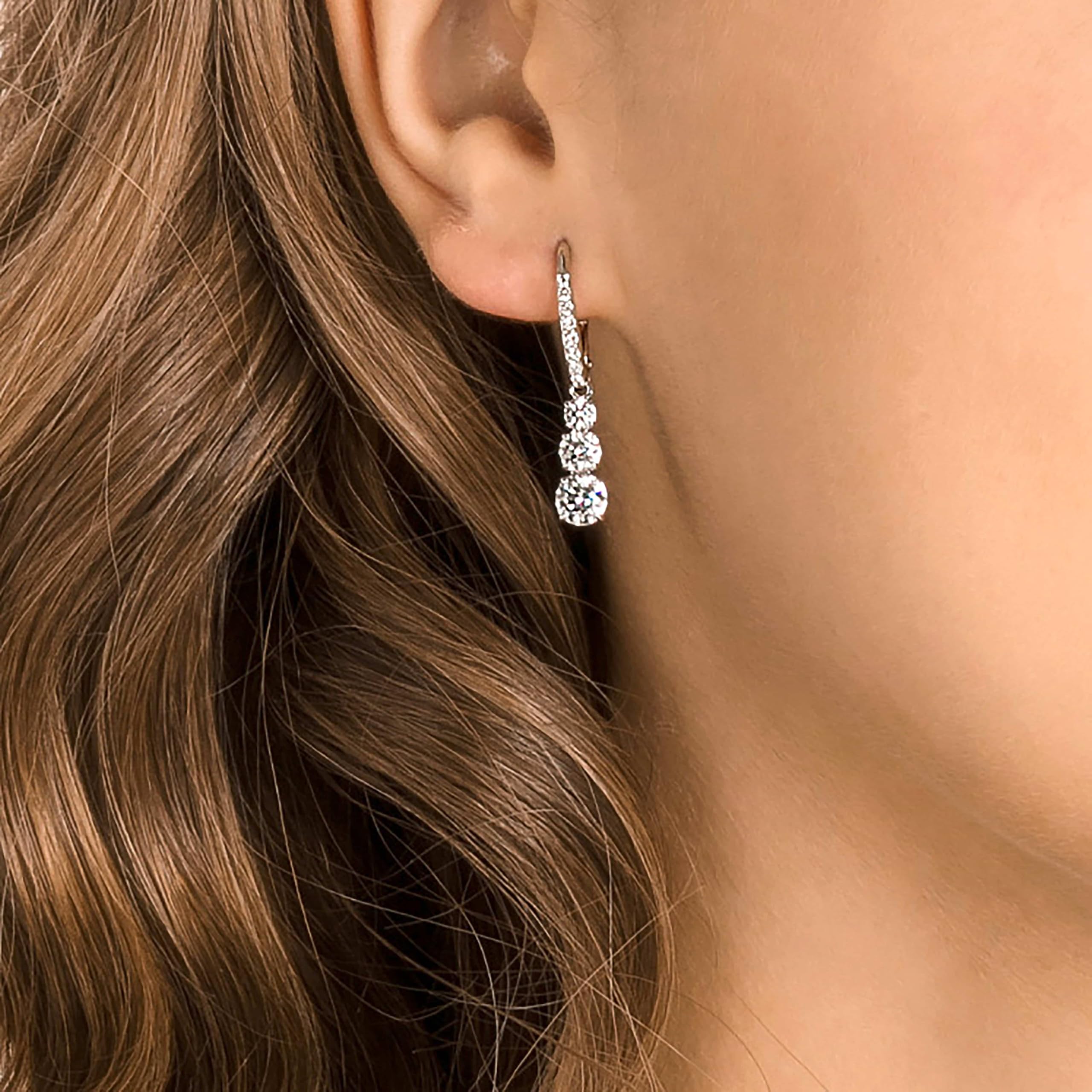 Swarovski Stilla Attract Trilogy Drop Pierced Earrings with White Crystals on a Rhodium Plated Setting with Hinged Closure thumbnail