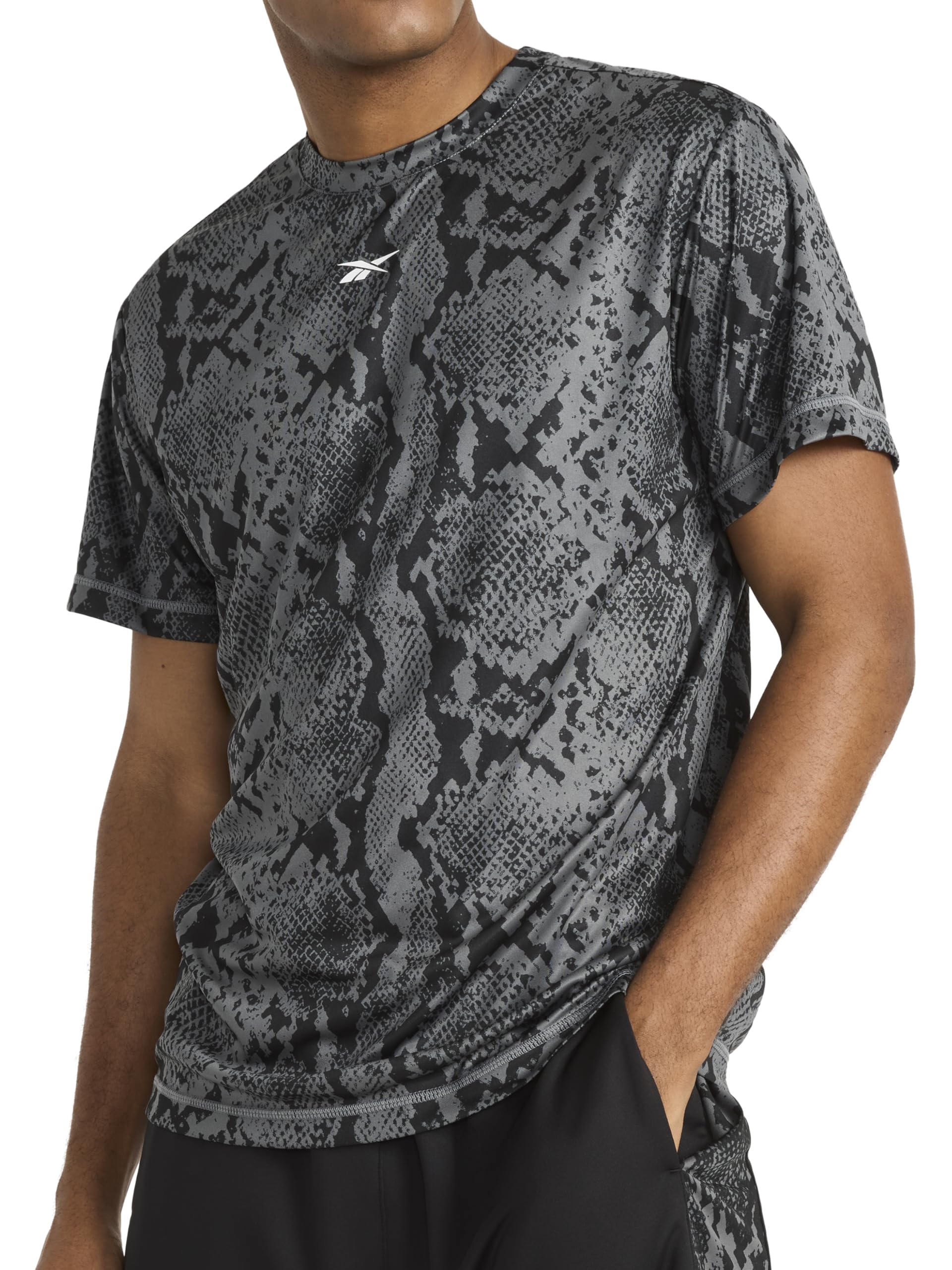 Reebok Men's Small Logo Short Sleeve Crewneck T-Shirt, Standard Fit, Breathable Lightweight Stretch Knit Fabric thumbnail