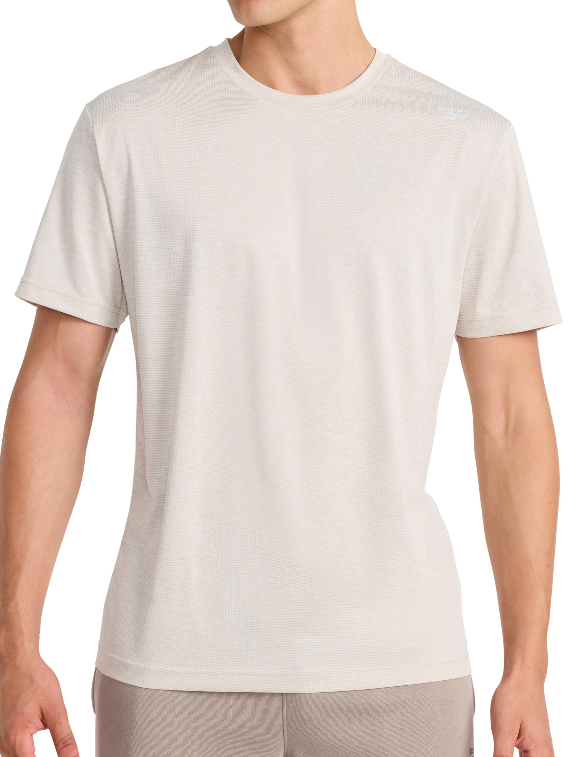 Reebok Men's Small Logo Short Sleeve Crewneck T-Shirt, Standard Fit, Breathable Lightweight Stretch Knit Fabric thumbnail